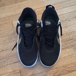 Nike Hustle Black Sneakers with Gold Swoosh sz 6 big kid Great Used condition